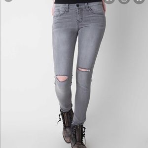 Ripped grey skinny jeans